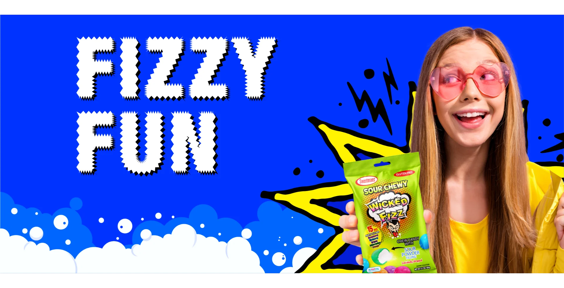 Girl wearing heart-shaped glasses holding a bag of Sweetsman Wicked Fizz Sour Chewy candy with the text "Fizzy Fun" on a bright blue background with a yellow comic-style burst.